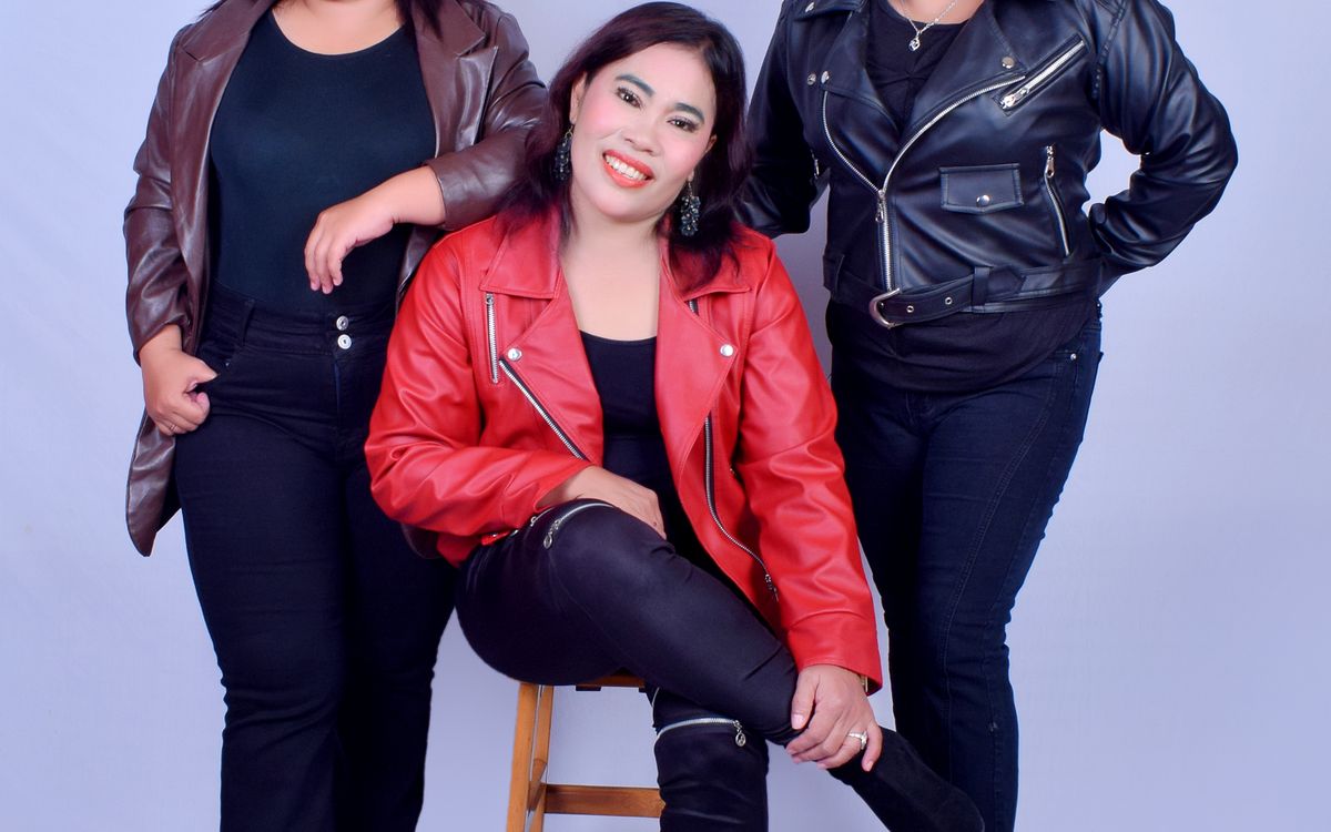 A leather jacket worn casually on a warm summer evening