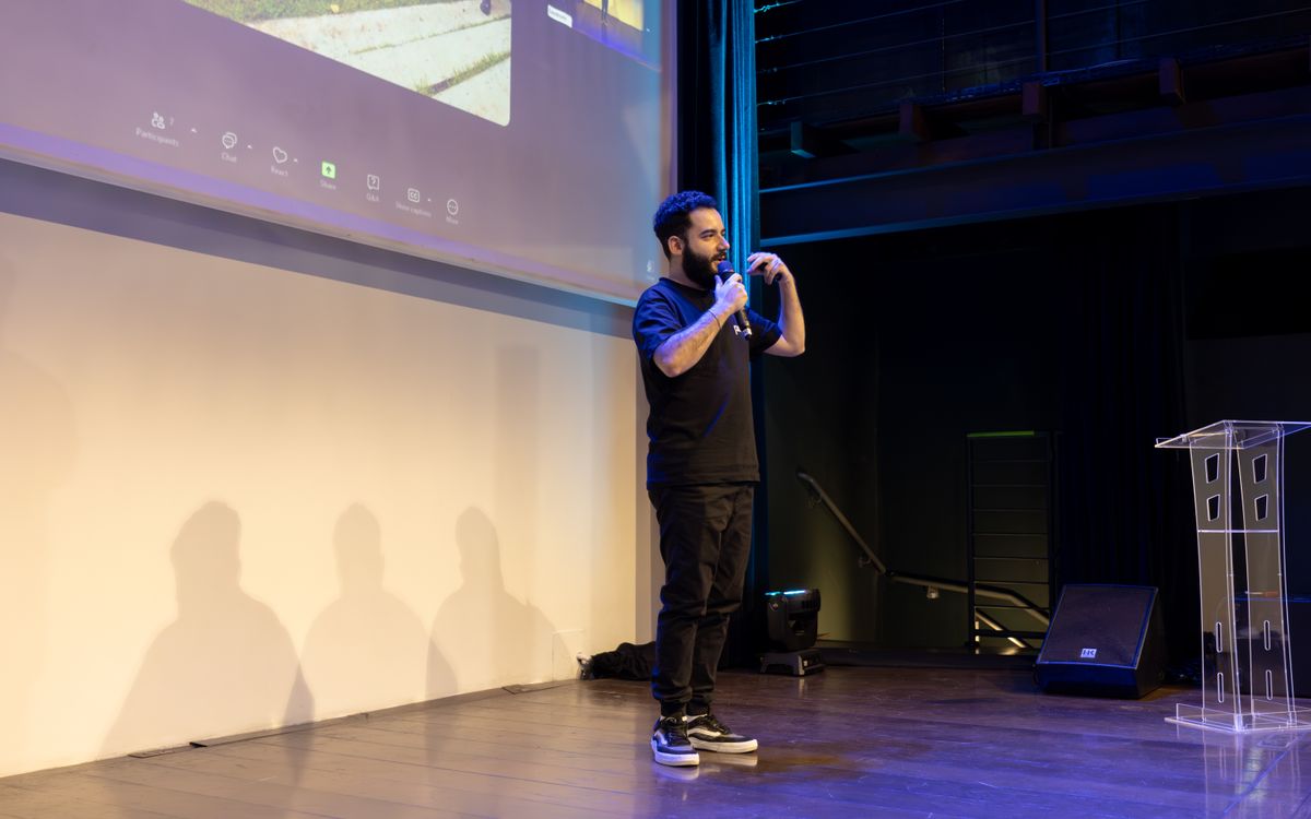 Energetic speaker delivering a talk at a corporate event