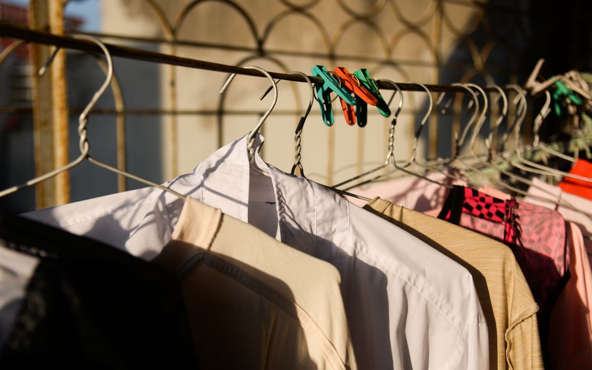 Clothes drying on a sunny outdoor rack