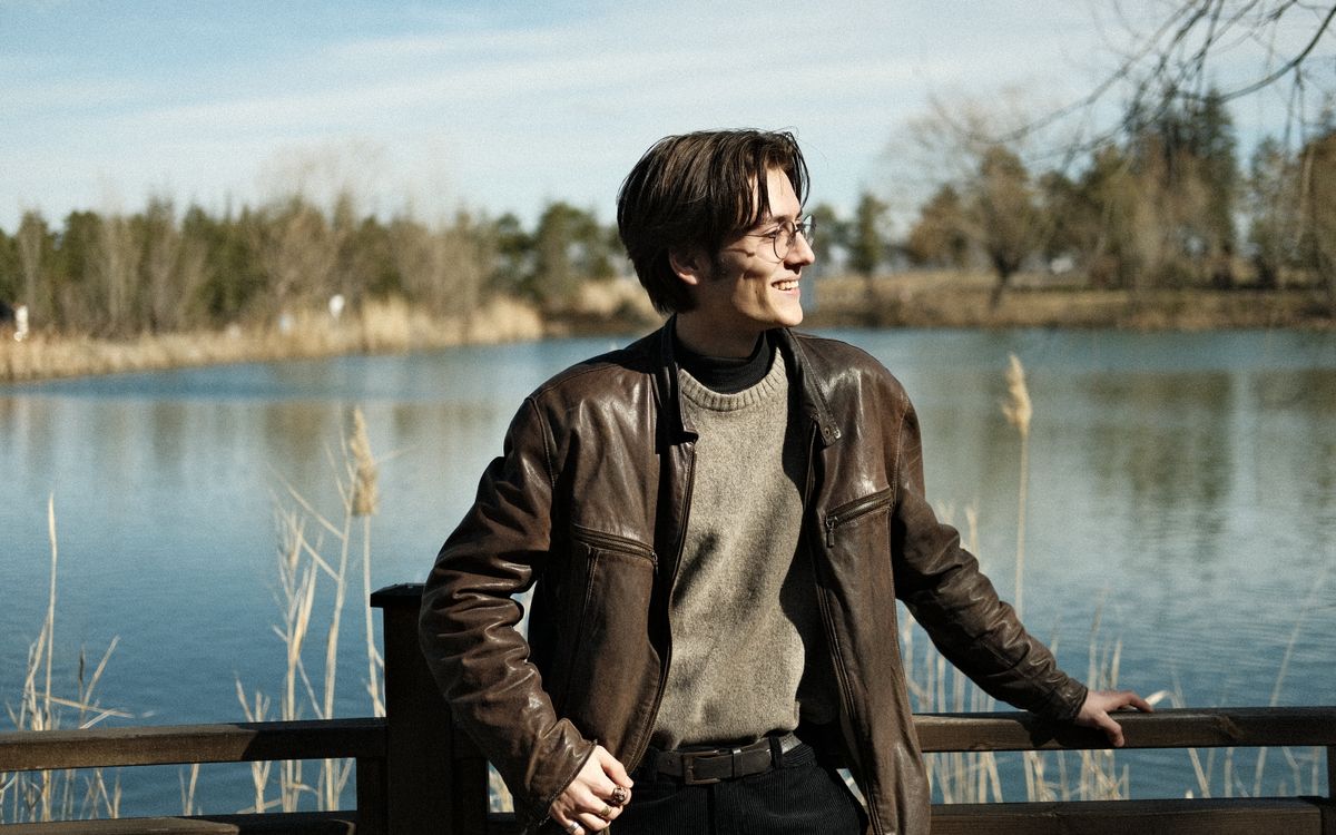 A brown leather jacket photographed in warm natural light